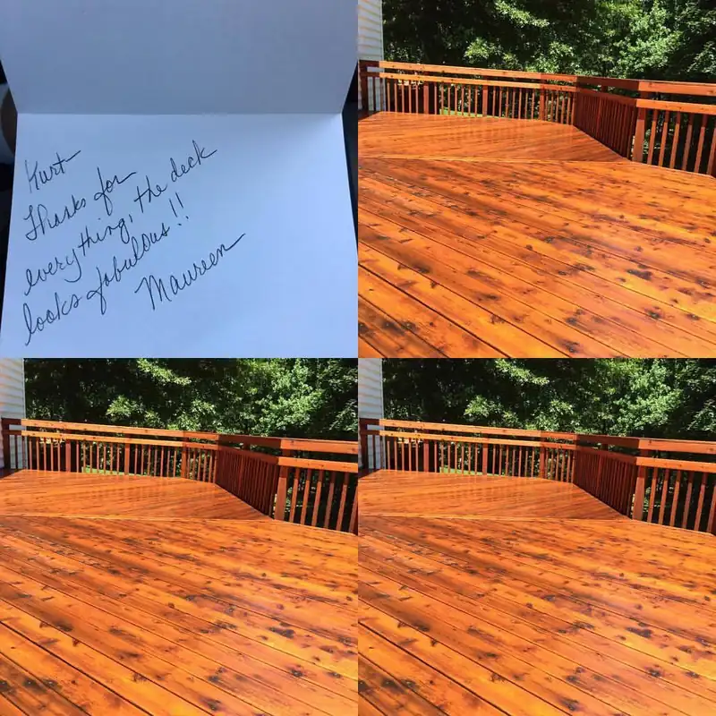 A freshly finished cedar deck glowing orange in the sun, with a handwritten thank you card from the homeowner